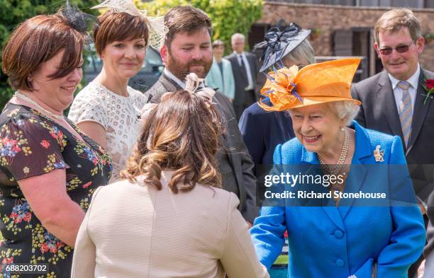 Queen Elizabeth II meets tennants and Douchy of Lancaster estate staff at Lower Castle Hayes farm, one of the Duchy of Lancaster Farms on May 25,...