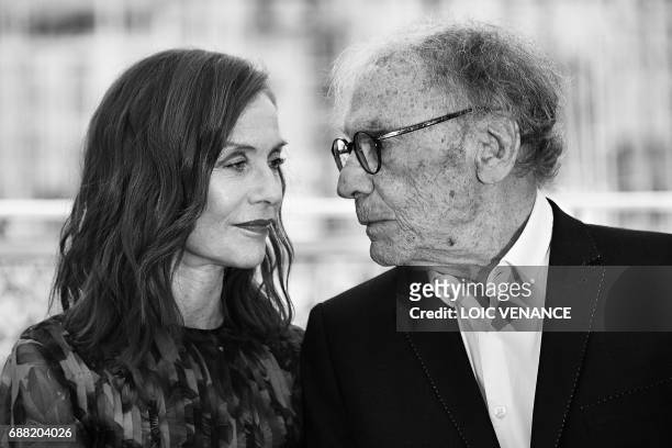 French actress Isabelle Huppert and French actor Jean-Louis Trintignant pose on May 22, 2017 during a photocall for the film 'Happy End' at the 70th...