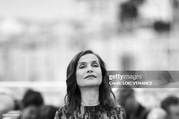 French actress Isabelle Huppert poses on May 22, 2017 during a photocall for the film 'Happy End' at the 70th edition of the Cannes Film Festival in...