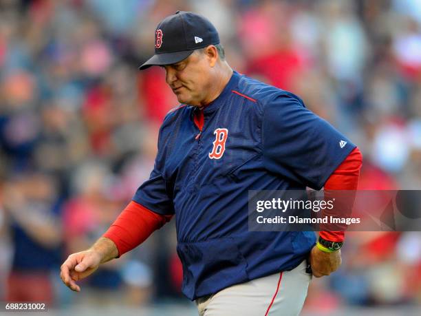 Manager John Farrell of the Boston Red Sox walks off the field after making a pitching change during Game 2 of the American League Division Series...