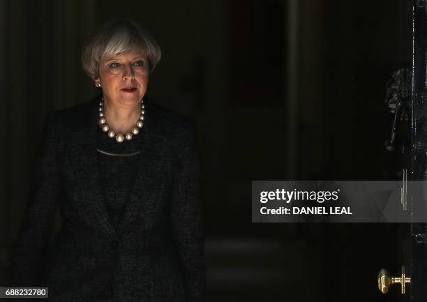 Britain's Prime Minister Theresa May leaves 10 Downing Street in central London on May 25, 2017. Britain's Prime Minister Theresa May said Thursday...