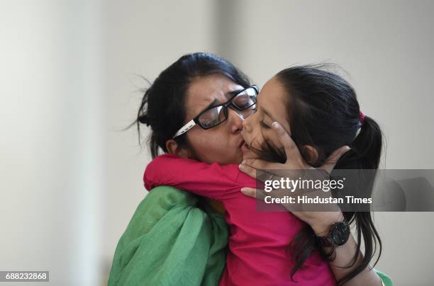 Uzma Ahmed hugs her daughter during her meeting with External Minister Sushma Swaraj at Jawahar Bhawan after returning from Pakistan on May 25, 2017...