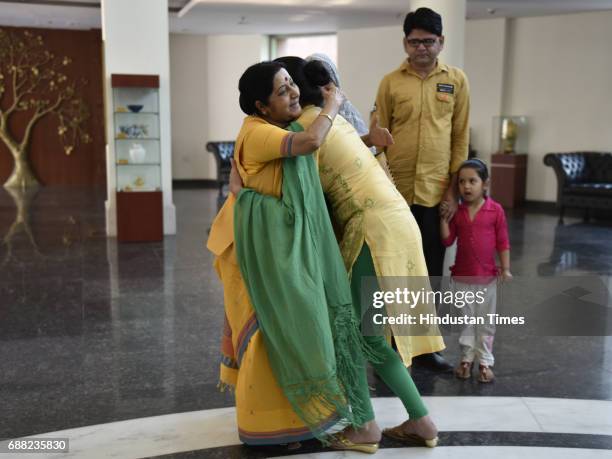 Uzma Ahmed hugs Union External Affairs Minister Sushma Swaraj at Jawahar Bhawan after returning from Pakistan on May 25, 2017 in New Delhi, India....