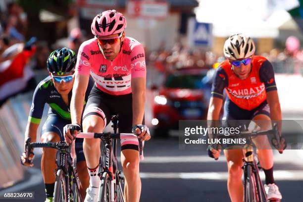 Pink jersey Netherlands' Tom Dumoulin of team Sunweb, Colombia's Nairo Quintana of team Movistar and Italy's rider of team Bahrain - Merida Vincenzo...