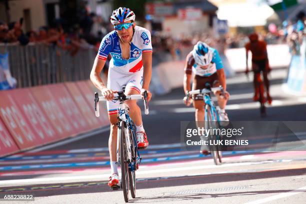 France's Thibaut Pinot of team FDJ crosses the finish line ahead Italy's Domenico Pozzovivo of team during the 18th stage of the 100th Giro d'Italia,...