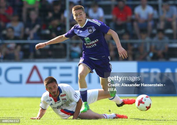 Alexis Saelemaekers of RSC Anderlecht goes past the challenge from Yoann Martelat of Olympique Lyonnais during the Final match between Olympique Lyon...