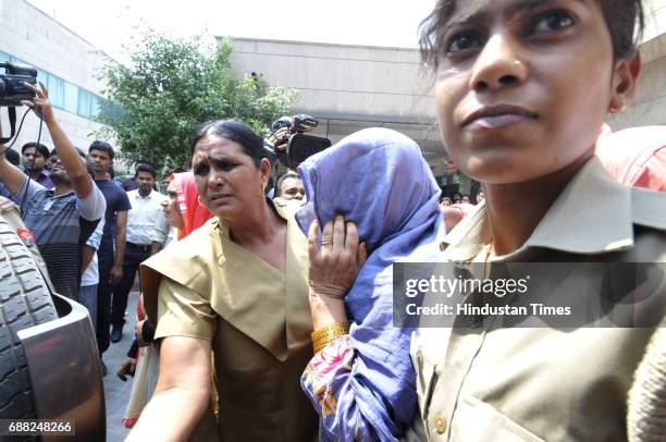 Gangrape victims escorted out of district hospital after conducting their medical test on May 25, 2017 in Noida, India. A gang of highway robbers...