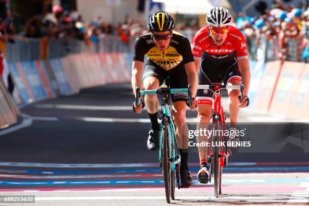 Netherlands' Steven Kruijswijk of team Lotto Jumbo crosses the finish line ahead Netherlands' Bauke Mollema of team Trek during the 18th stage of the...