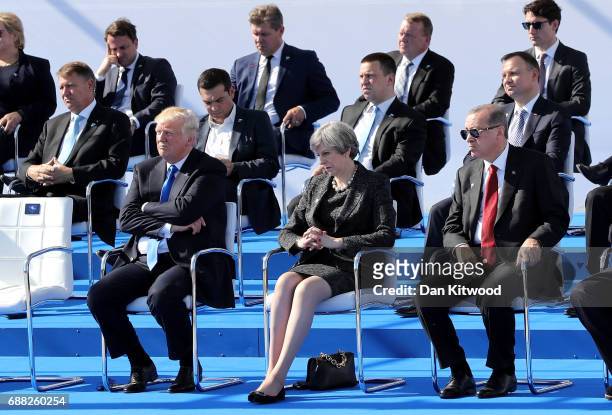 President, Donald Trump, British Prime Minister, Theresa May and Turkish President, Recep Tayyip Erdogan are pictured ahead of a photo opportunity of...