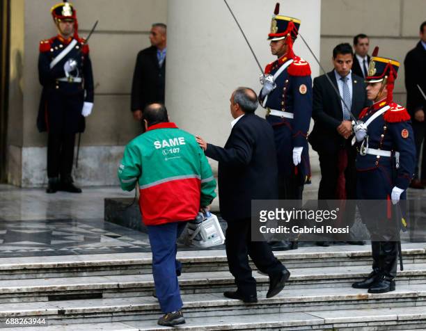 Medical staff walks into the Metropolitan Cathedral to assist Mayor of Buenos Aires Horacio Rodriguez Larreta for a low pressure episode during the...