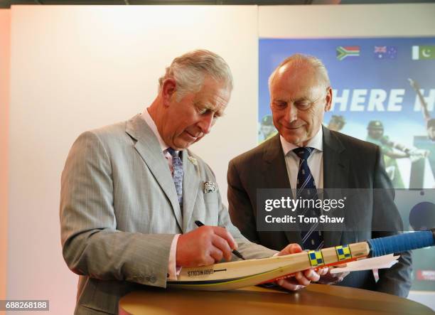 The Prince of Wales signs a bat with Colin Graves of the ECB Launches the ICC Champions The ICC Champions Trophy at The Oval on May 25, 2017 in...