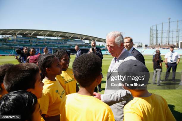 The Prince of Wales meets and greets kids at the launch of the ICC Champions Trophy at The Oval on May 25, 2017 in London, England.