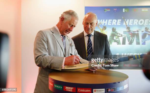 The Prince of Wales signs a bat with Colin Graves of the ECB Launches the ICC Champions The ICC Champions Trophy at The Oval on May 25, 2017 in...
