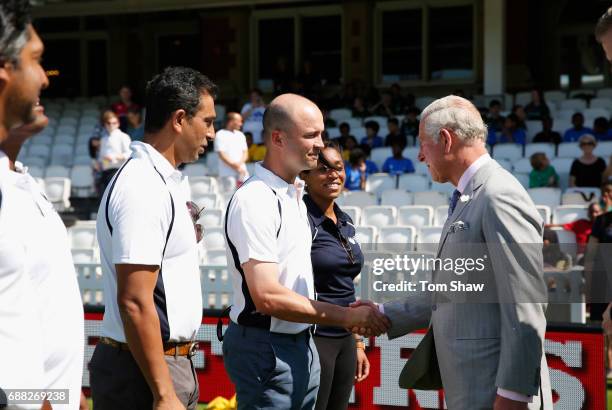 The Prince of Wales meets Jonathan Trott of England at the launch of the ICC Champions Trophy at The Oval on May 25, 2017 in London, England.