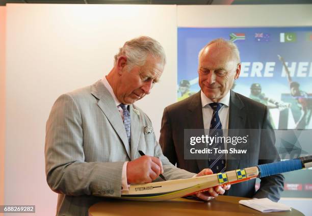 The Prince of Wales signs a bat with Colin Graves of the ECB Launches the ICC Champions The ICC Champions Trophy at The Oval on May 25, 2017 in...