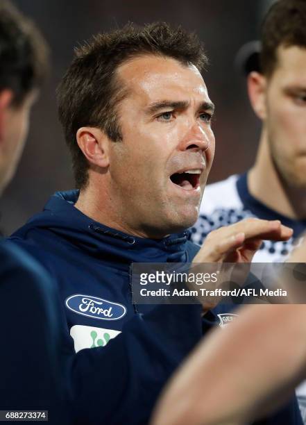 Chris Scott, Senior Coach of the Cats addresses his players during the 2017 AFL round 10 match between the Geelong Cats and Port Adelaide Power at...