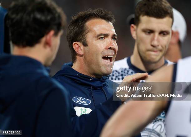 Chris Scott, Senior Coach of the Cats addresses his players during the 2017 AFL round 10 match between the Geelong Cats and Port Adelaide Power at...