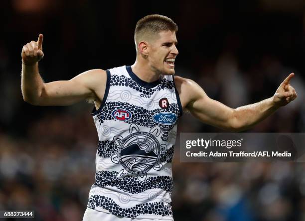 Zac Smith of the Cats celebrates on the final siren during the 2017 AFL round 10 match between the Geelong Cats and Port Adelaide Power at Simonds...