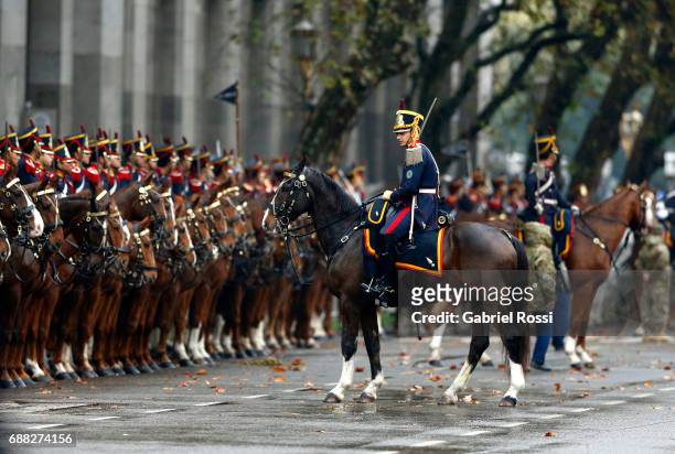 Argentine Mounted Grenadiers guard President Mauricio Macri as he heads for the Tedeum Mass in honour to the 207th anniversary of the Revolucion de...