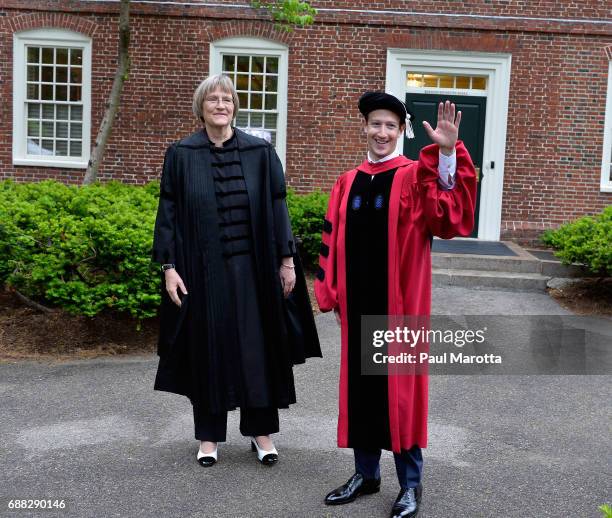 Facebook Founder and CEO Mark Zuckerberg poses with President Drew Faust and received an Honorary Doctor of Laws Degree from Harvard University at...