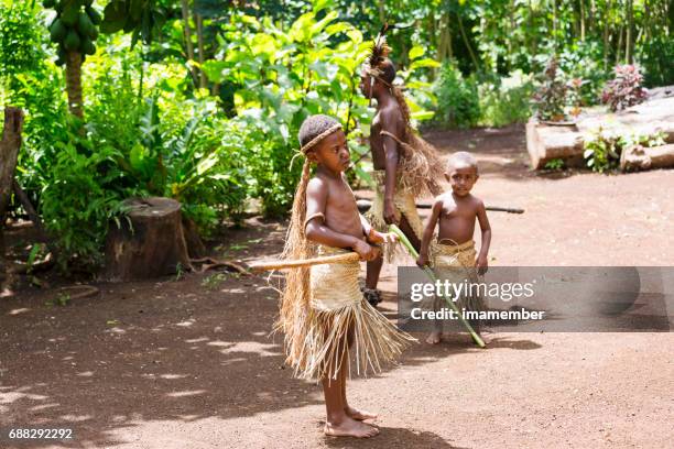 tribal boys from vanuatu in traditional costumes - melanesia stock pictures, royalty-free photos & images