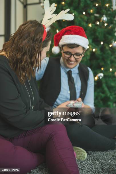 holiday couple - gay santa claus stock pictures, royalty-free photos & images