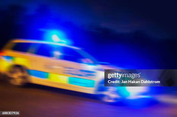 police car speeding - politie stockfoto's en -beelden