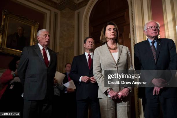 Rep. Steny Hoyer , Rep. Donald Norcross , House Minority Leader Nancy Pelosi and Sen. Bernie Sanders look on during a press conference to discuss...