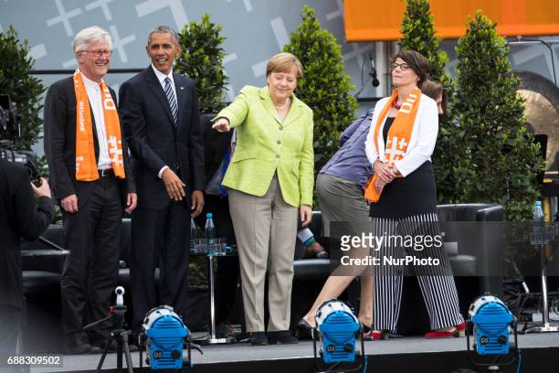 Former US President Barack Obama , German Chancellor Angela Merkel and chairman of the Council of the Evangelical Church in Germany Heinrich...