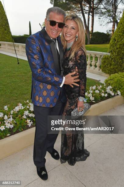 Steve Varsano and Lisa Tchenguiz arrive at the amfAR Gala Cannes 2017 at Hotel du Cap-Eden-Roc on May 25, 2017 in Cap d'Antibes, France.