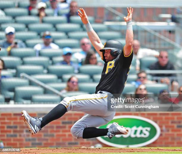 Francisco Cervelli of the Pittsburgh Pirates scores a second inning run against the Atlanta Braves at SunTrust Park on May 25, 2017 in Atlanta,...