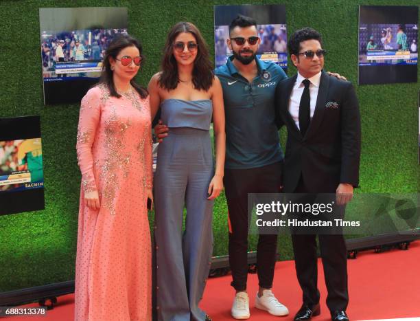 Anjali Tendulkar, actress Anushka Sharma, Virat Kohli and Sachin Tendulkar during the screening of 'Sachin: A Billion Dreams' film at PVR on May 24,...