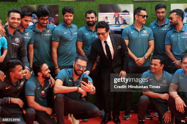 Master Blaster Sachin Tendulkar with the Indian cricket team during the screening of 'Sachin: A Billion Dreams' film at PVR on May 24, 2017 in...