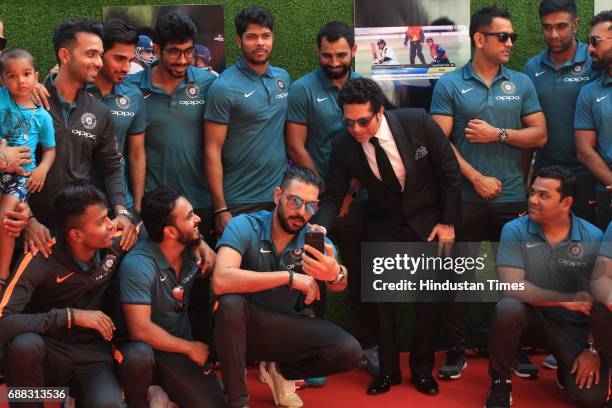 Master Blaster Sachin Tendulkar with the Indian cricket team during the screening of 'Sachin: A Billion Dreams' film at PVR on May 24, 2017 in...