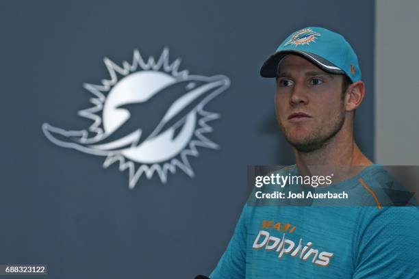 Ryan Tannehill of the Miami Dolphins talks to the media after the teams OTA's on May 25, 2017 at the Miami Dolphins training facility in Davie,...