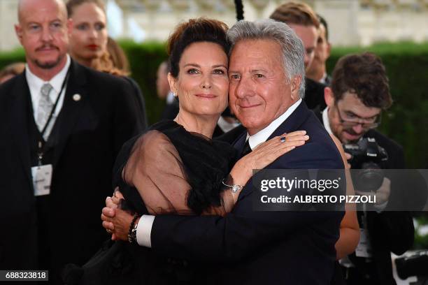 Actor Dustin Hoffman and his wife Lisa pose as they arrive for the amfAR's 24th Cinema Against AIDS Gala on May 25, 2017 at the Hotel du Cap-Eden-Roc...