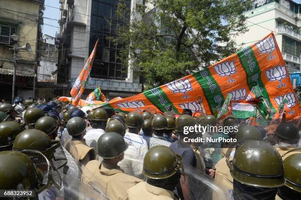 Indian police stopped the Bharatiya Janata Party activists during their march to the police headquarters in Kolkata, India on Thursday, 25th...