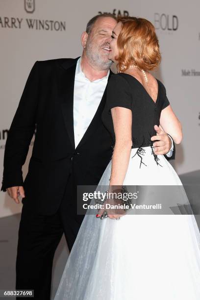 Harvey Weinstein and Lindsay Lohan arrive at the amfAR Gala Cannes 2017 at Hotel du Cap-Eden-Roc on May 25, 2017 in Cap d'Antibes, France.