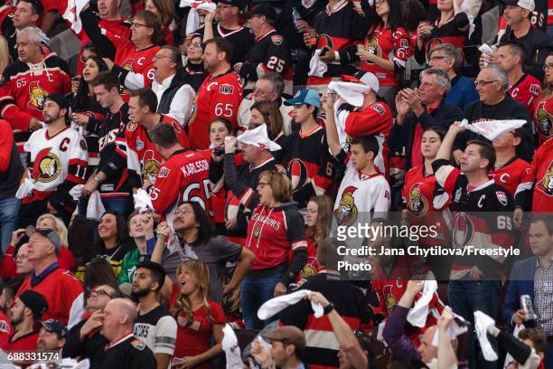 Fans cheer during a game between the Ottawa Senators and the Pittsburgh Penguins in Game Six of the Eastern Conference Final during the 2017 NHL...