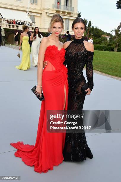 Nadine Leopold and Lara Lieto arrive at the amfAR Gala Cannes 2017 at Hotel du Cap-Eden-Roc on May 25, 2017 in Cap d'Antibes, France.