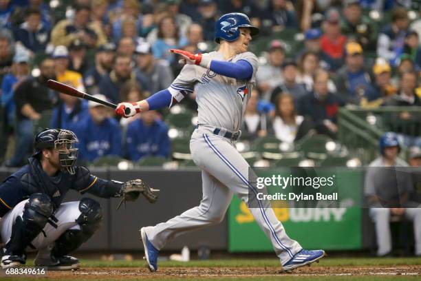 Chris Coghlan of the Toronto Blue Jays hits a single in the fifth inning against the Milwaukee Brewers at Miller Park on May 24, 2017 in Milwaukee,...