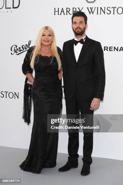 Monika Bacardi and Andrea Iervolino arrive at the amfAR Gala Cannes 2017 at Hotel du Cap-Eden-Roc on May 25, 2017 in Cap d'Antibes, France.