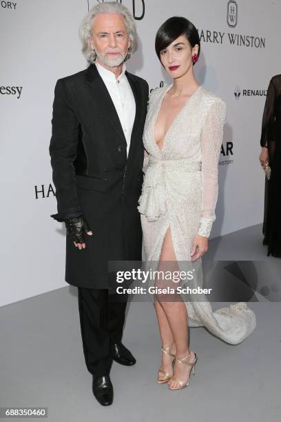 Hermann Bühlbecker and Paz Vega arrive at the amfAR Gala Cannes 2017 at Hotel du Cap-Eden-Roc on May 25, 2017 in Cap d'Antibes, France.