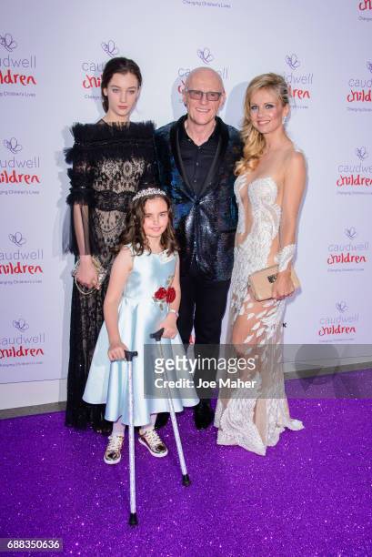 John Caudwell and Modesta Vzesniauskait attend the Caudwell Children Butterfly Ball at Grosvenor House, on May 25, 2017 in London, England.