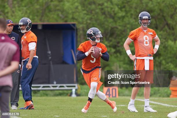 Chicago Bears quarterback Mike Glennon and Chicago Bears quarterback Mark Sanchez and Chicago Bears quarterback Connor Shaw participates in drills...