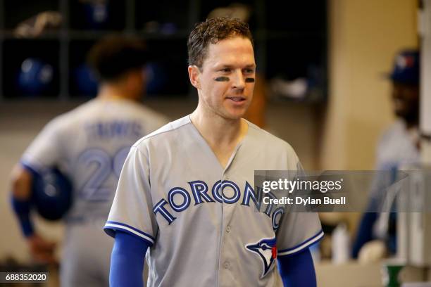 Chris Coghlan of the Toronto Blue Jays walks through the dugout in the sixth inning against the Milwaukee Brewers at Miller Park on May 24, 2017 in...