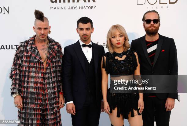 Cole Whittle, Joe Jonas, JinJoo Lee and Jack Lawless from DNCE arrive at the amfAR Gala Cannes 2017 at Hotel du Cap-Eden-Roc on May 25, 2017 in Cap...