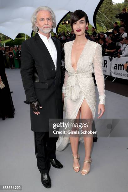 Hermann Bühlbecker and Paz Vega arrive at the amfAR Gala Cannes 2017 at Hotel du Cap-Eden-Roc on May 25, 2017 in Cap d'Antibes, France.