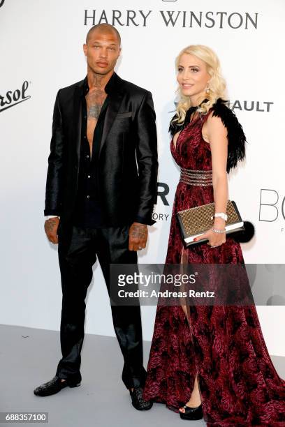 Jeremy Meeks and a guest arrive at the amfAR Gala Cannes 2017 at Hotel du Cap-Eden-Roc on May 25, 2017 in Cap d'Antibes, France.