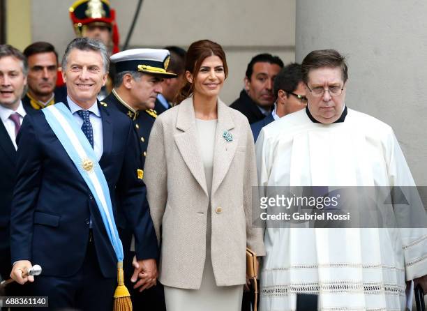 President of Argentina Mauricio Macri and his wife Juliana Awada smile after the Tedeum Mass in honour to the 207th anniversary of the Revolucion de...